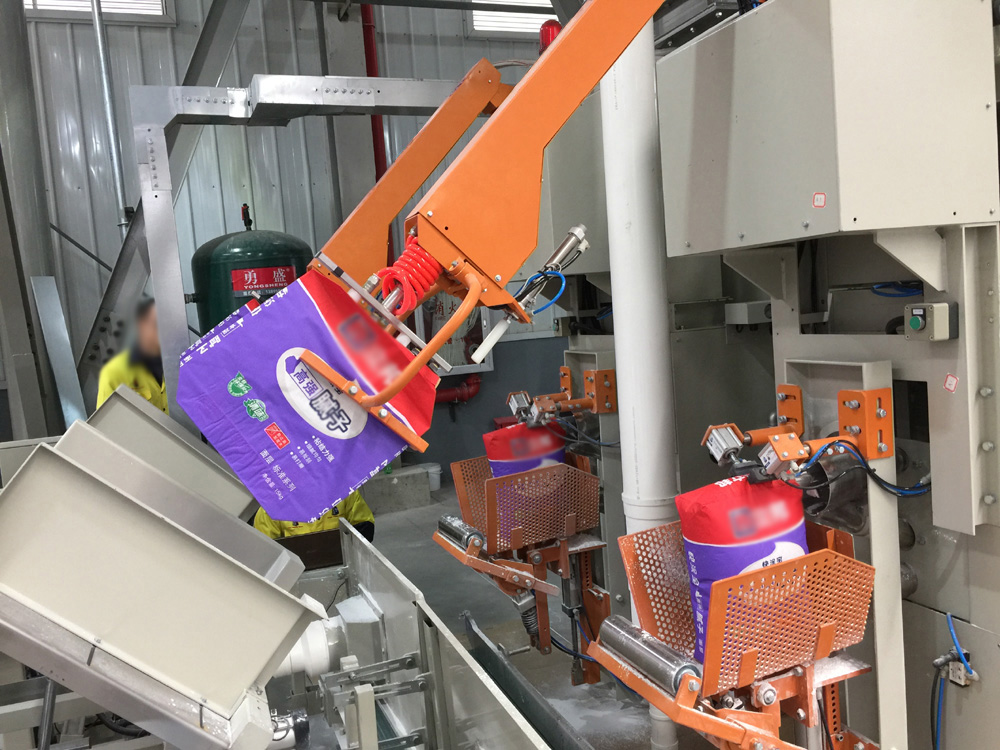 全自動閥(fá)口上袋機 自動上(shang)袋機 全自動包裝(zhuāng)機 第1張